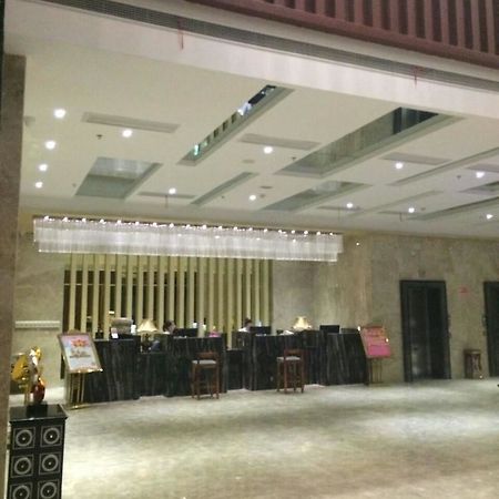 Sheng Jing Yi Jia Hotel Huji Bagian luar foto