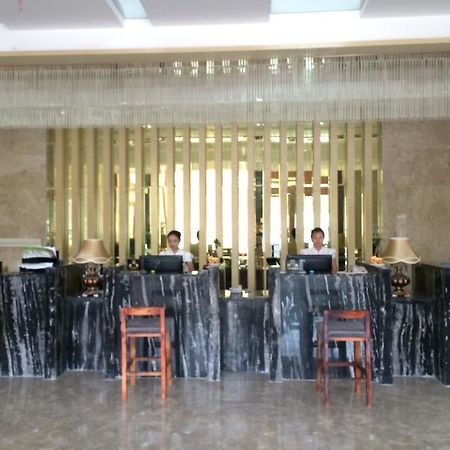 Sheng Jing Yi Jia Hotel Huji Bagian luar foto