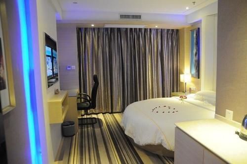 Sheng Jing Yi Jia Hotel Huji Bagian luar foto