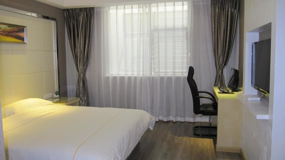 Sheng Jing Yi Jia Hotel Huji Bagian luar foto