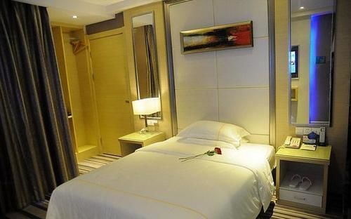 Sheng Jing Yi Jia Hotel Huji Bagian luar foto