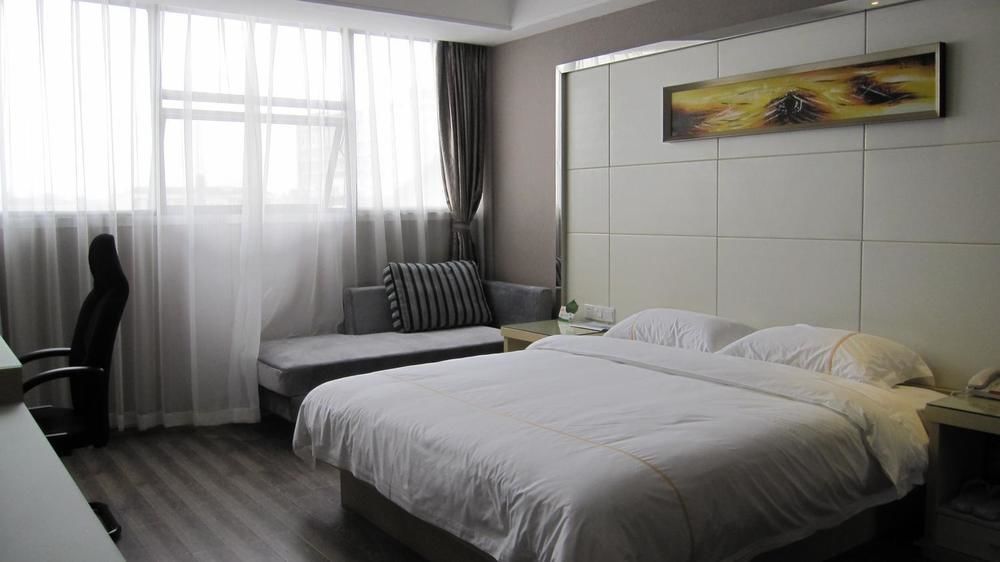Sheng Jing Yi Jia Hotel Huji Bagian luar foto